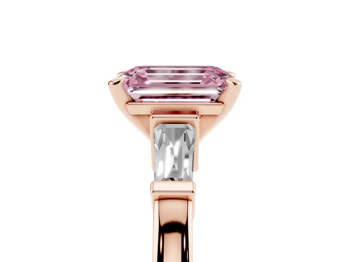 Fancy Pink Emerald Cut Cut Diamond Solitaire Ring with Tapered Baguette Accents and Four-Prong Setting Rose gold