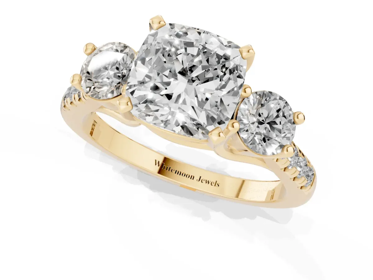 Three-Stone Cushion Cut Diamond Pavé Band with Four-Prong Setting Yellow gold