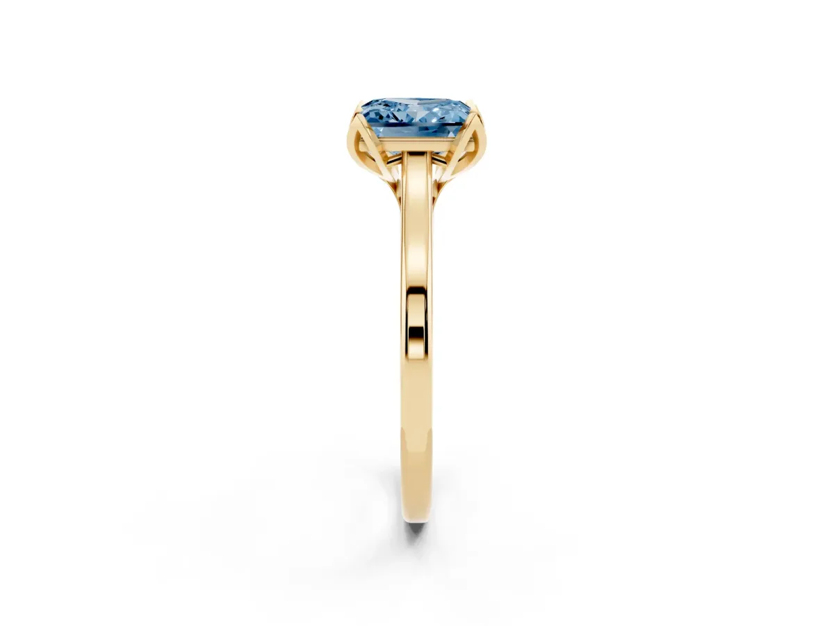 Fancy Blue Princess Cut Diamond Solitaire Ring with Flower Prong Setting and Classic Band Yellow gold