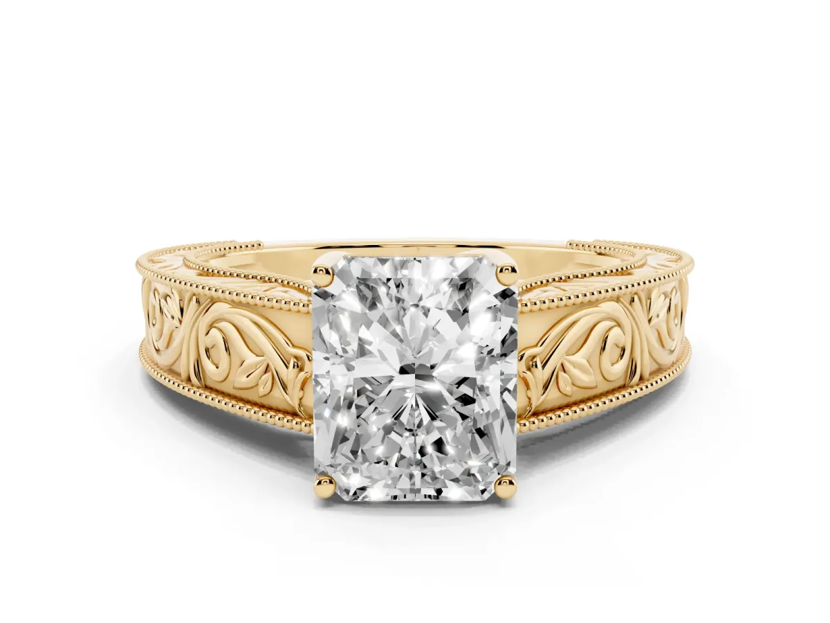 Radiant Cut Diamond Solitaire Ring with Engraved Band and Four-Prong Setting Yellow gold