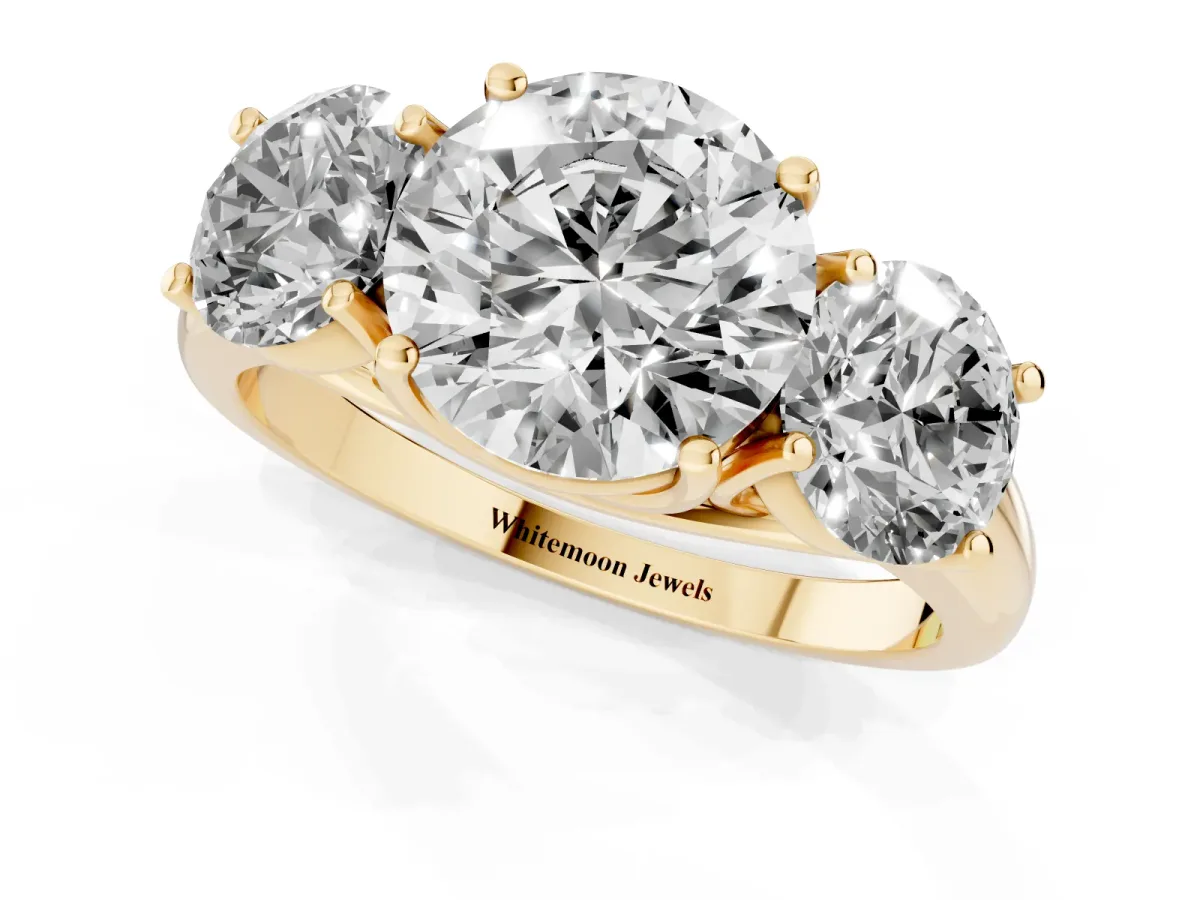Three-Stone Round Cut Diamond Engagement Ring with Prong Setting Yellow gold
