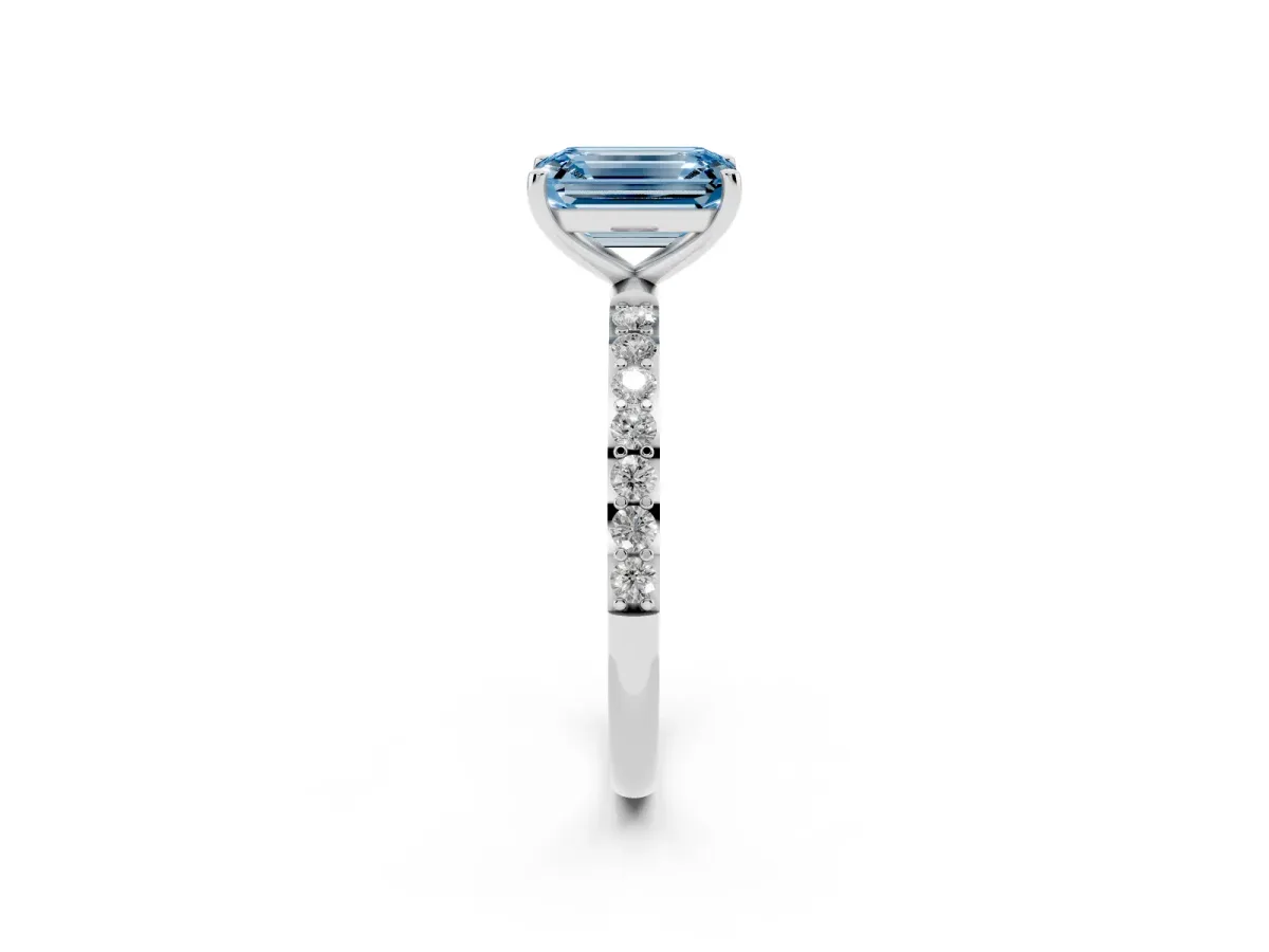 Fancy Blue Emerald Cut Diamond Solitaire Ring with Round Pavé Shoulders and Prong Setting Platinum