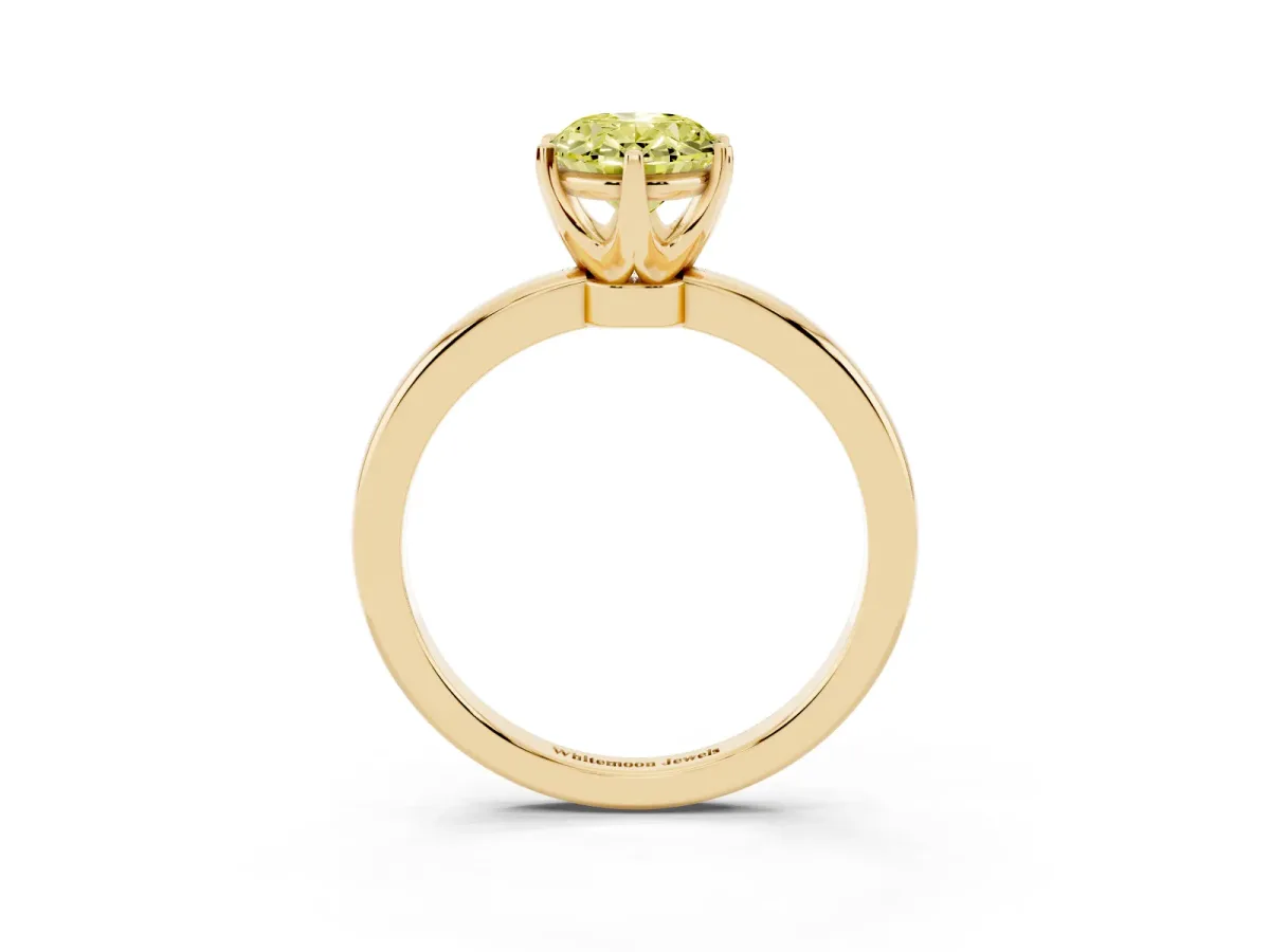 Fancy Yellow Oval Cut Solitaire Diamond Ring with Six-Prong Setting on a Classic Band Yellow gold