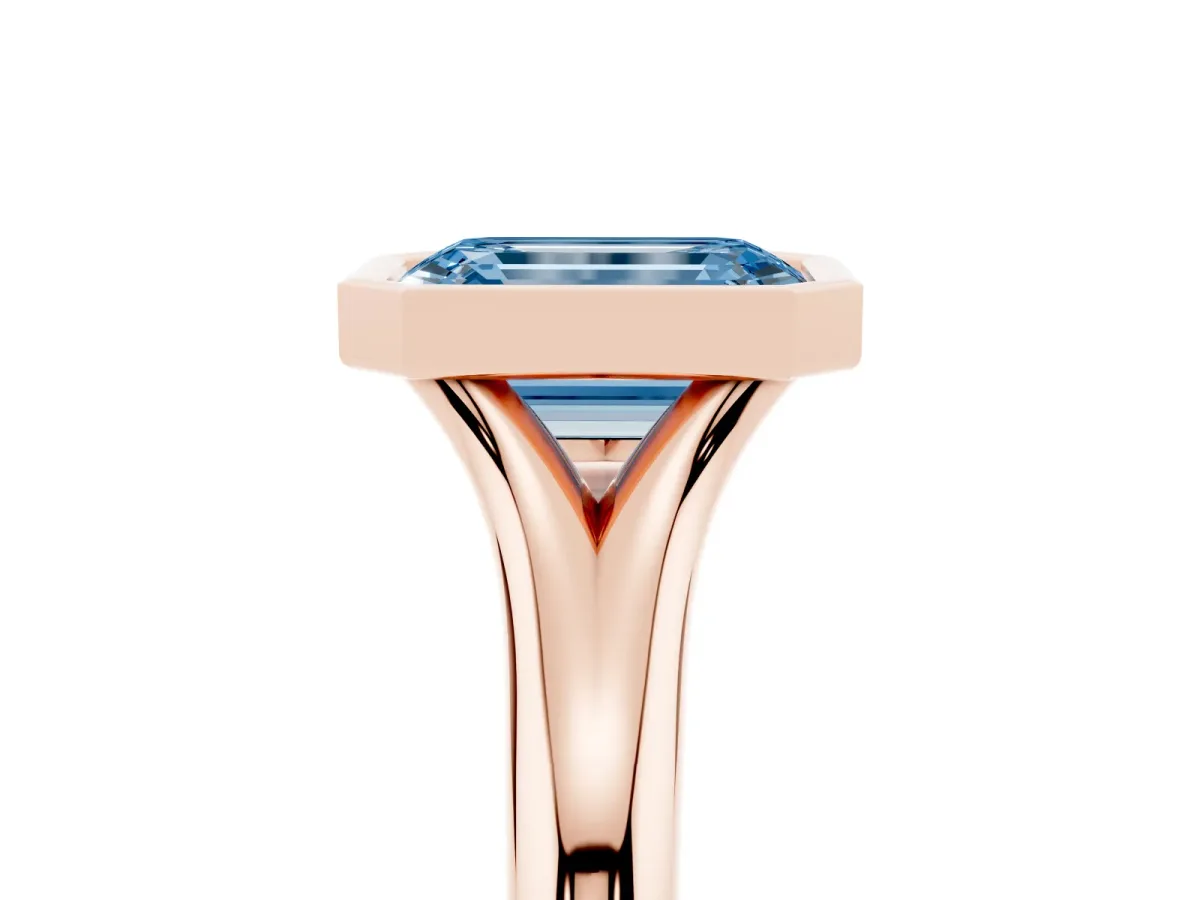 Fancy Blue Bezel Set Emerald Cut Solitaire Diamond Ring with Smooth Band Rose gold
