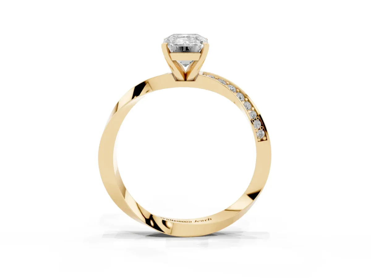 Emerald Cut Diamond Engagement Ring with Side Stone Accents and Four-Prong Setting Yellow gold
