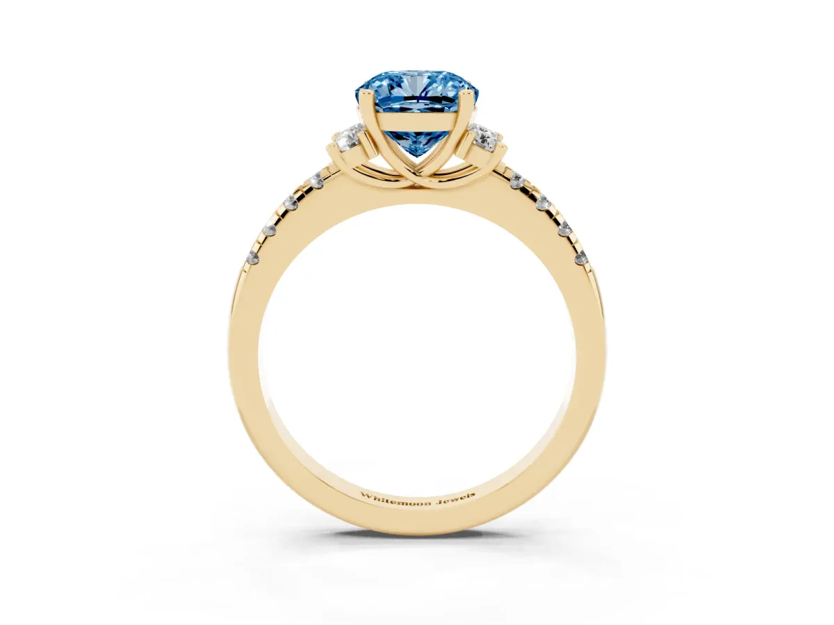 Fancy Blue Cushion Cut Diamond Three-Stone Pave Band with Four-Prong Setting Yellow gold