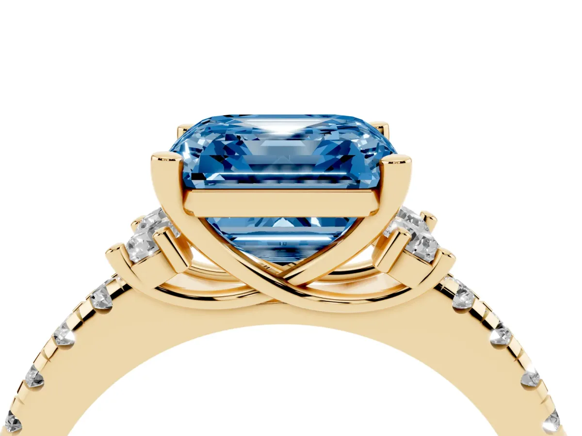 Fancy Blue Asscher Cut Diamond Three-Stone Pave Band with Four-Prong Setting Yellow gold