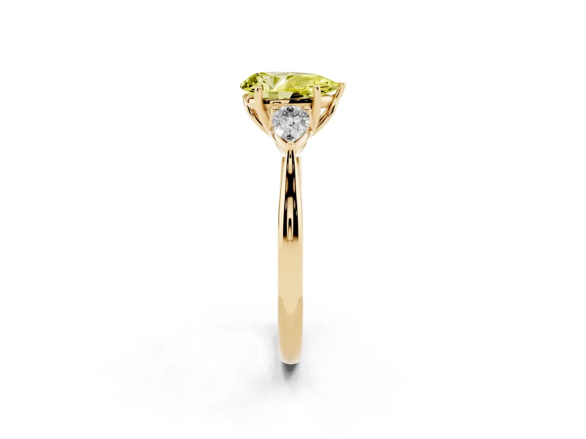 Fancy Yellow Three-Stone Pear Cut Diamond Ring with Pear Side Stones in Four-Prong Setting Yellow gold