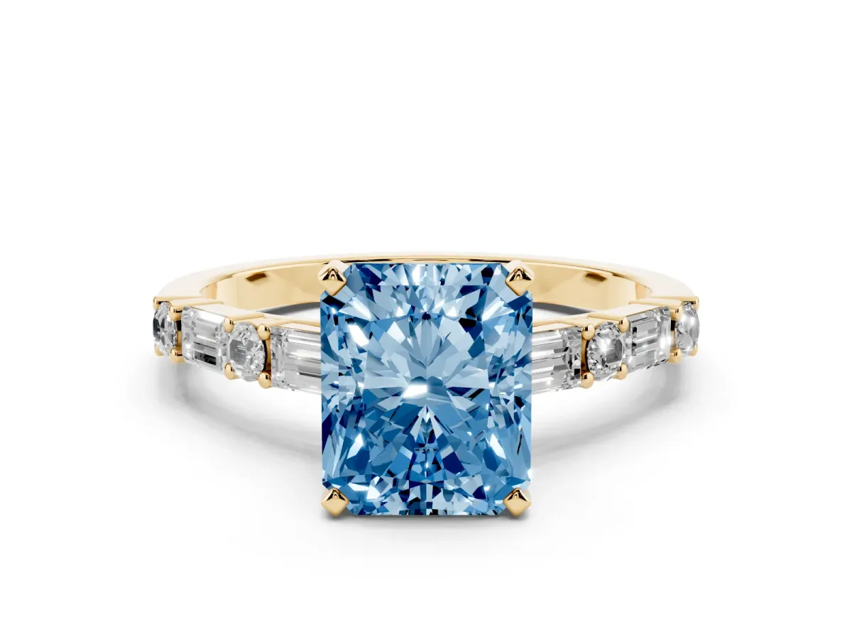 Fancy Blue Radiant Cut Diamond Solitaire with Side Baguettes and Channel Set Band Yellow gold