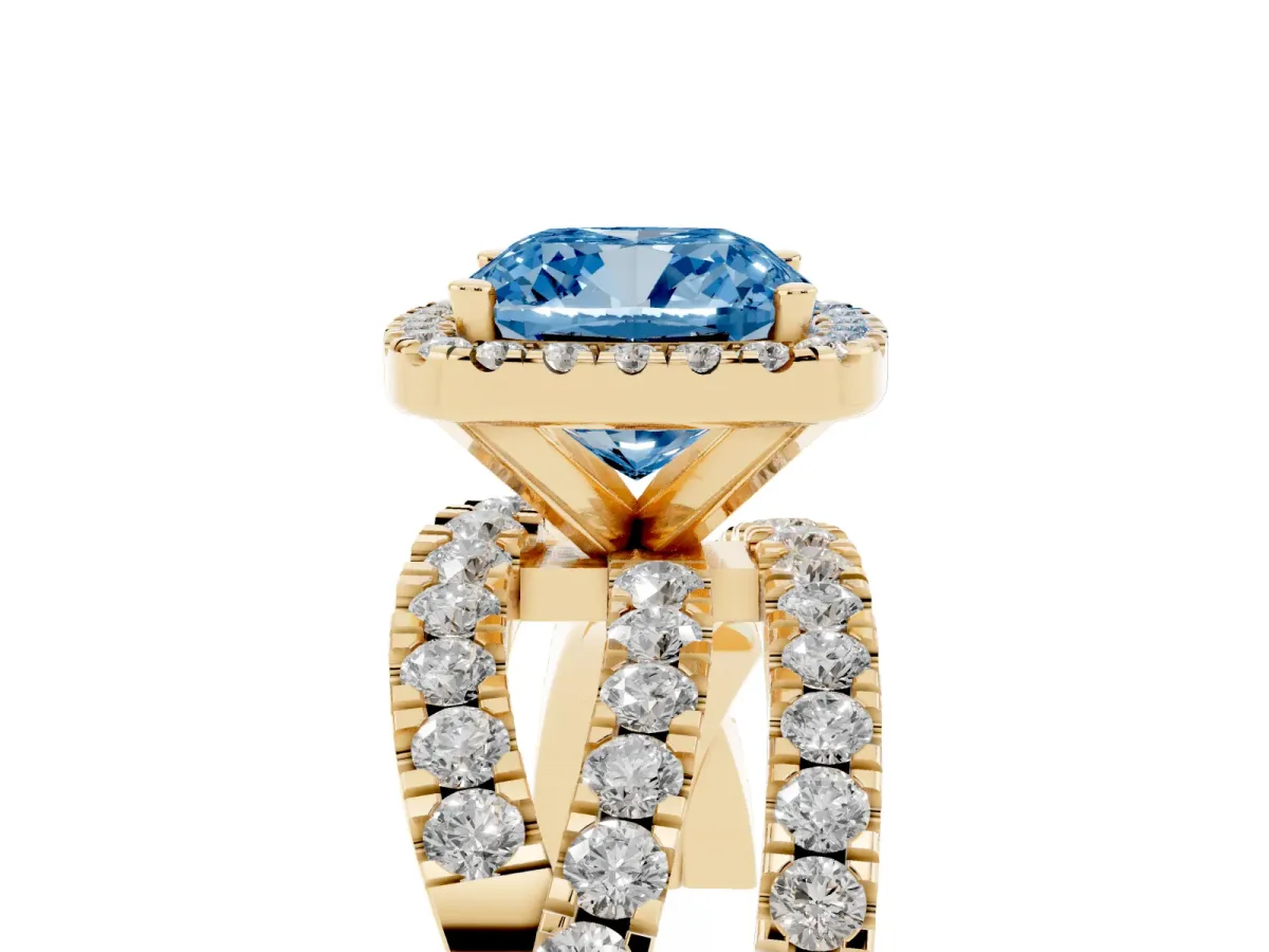 Fancy Blue Cushion Cut Diamond Halo Ring with Round Split Shank and Prong Setting Yellow gold
