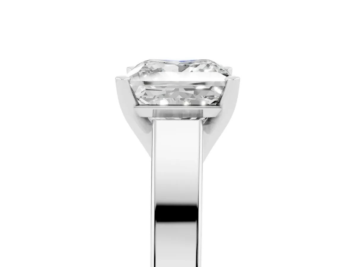Princess Cut Solitaire Engagement Ring with Four-Prong Setting and Tapered Band Silver