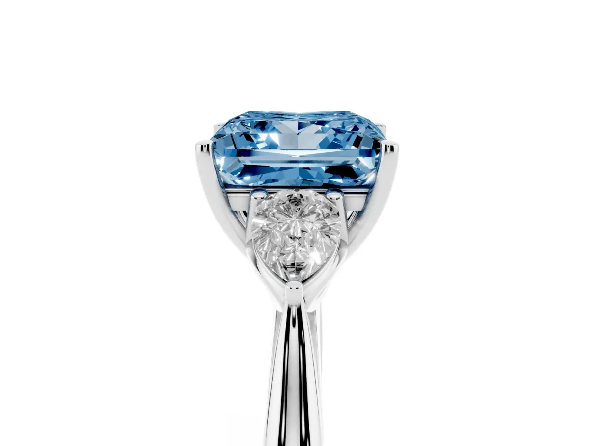 Fancy Blue Princess Cut Diamond Three-Stone Ring with Pear Side Stones and Prong Setting Silver