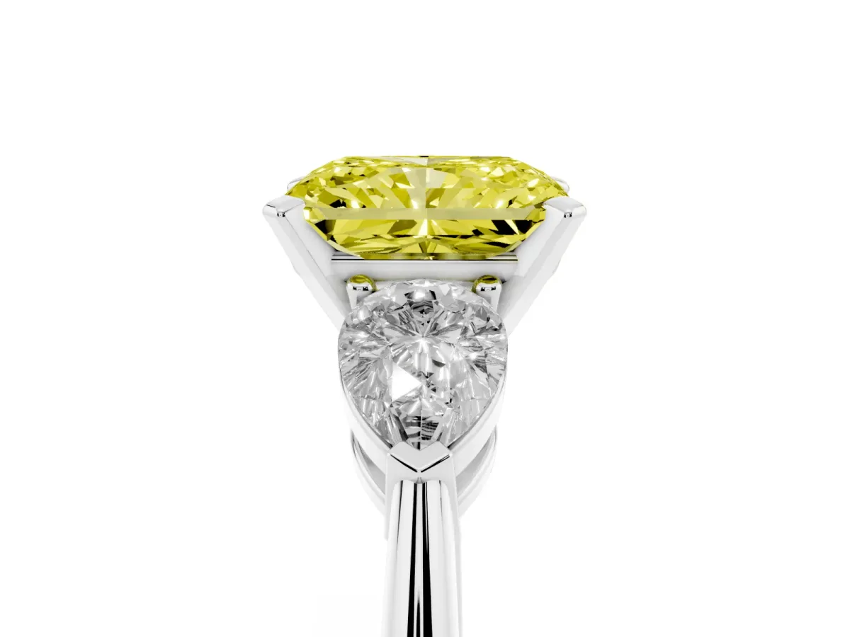 Fancy Yellow Three-Stone Radiant Cut Diamond Ring with Pear Side Stones and Four-Prong Setting Silver