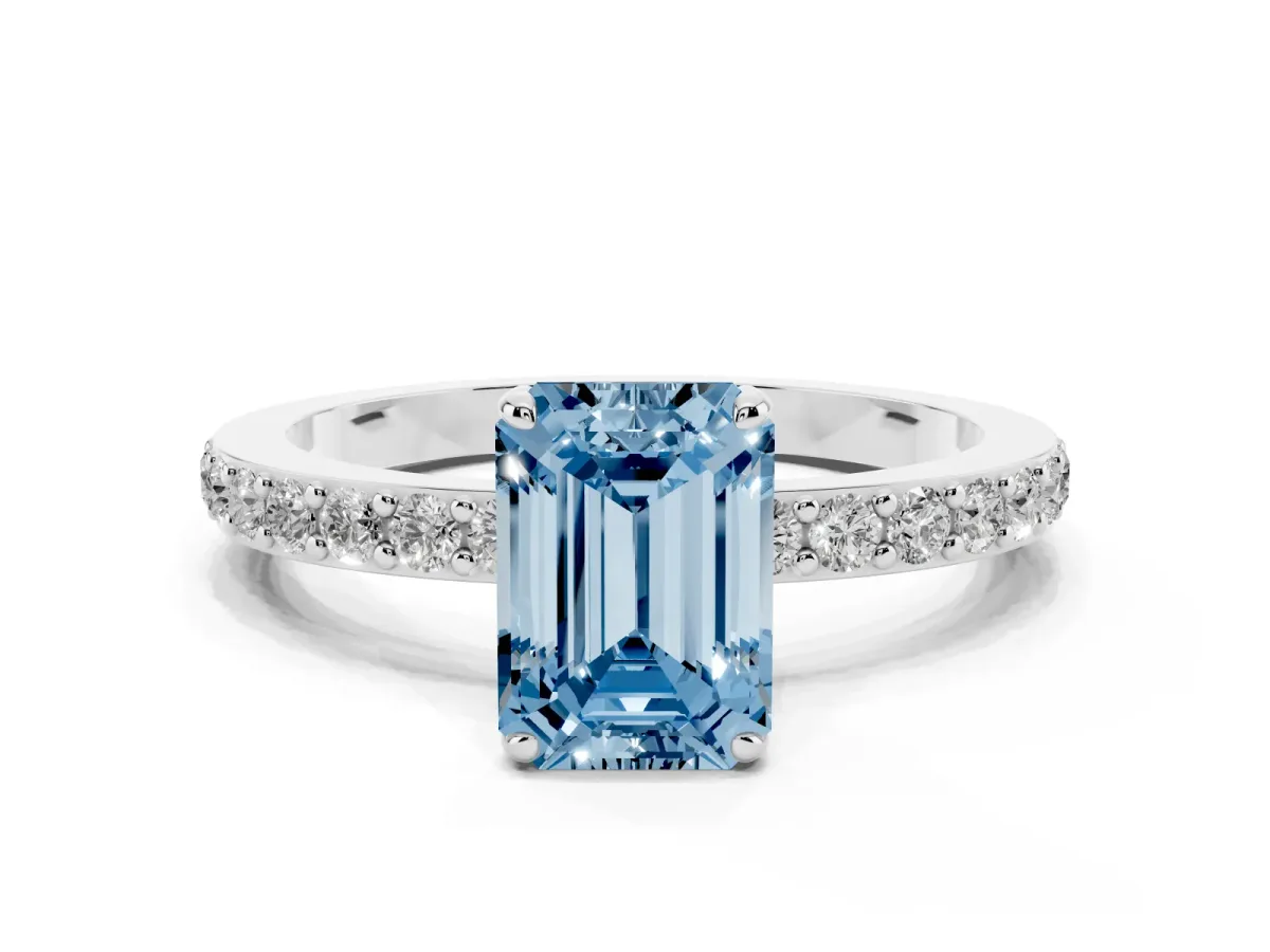 Fancy Blue Emerald Cut Diamond Pavé Engagement Ring with Round Accents and Prong Setting Platinum
