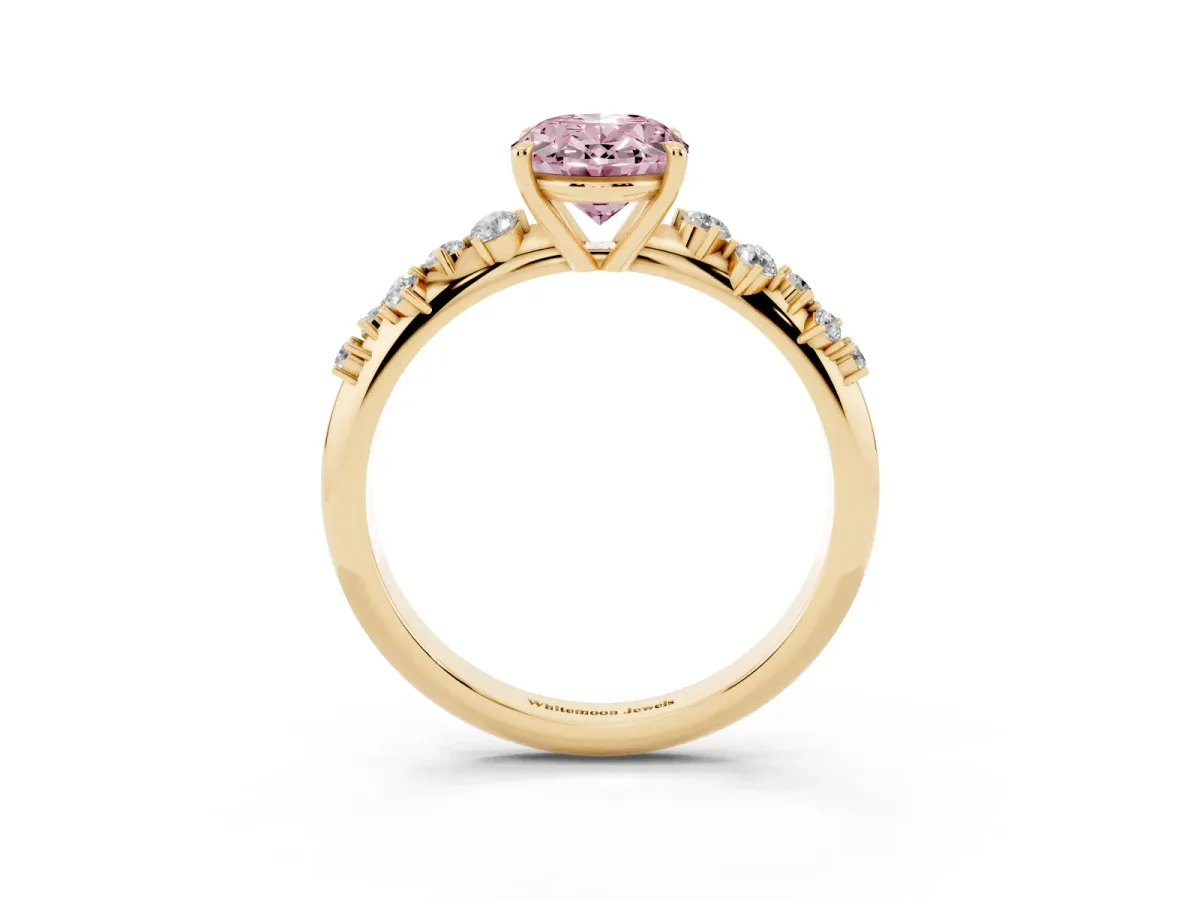 Fancy Pink Oval Cut Diamond Cluster Side Stone Solitaire Ring with Prong Setting Yellow gold