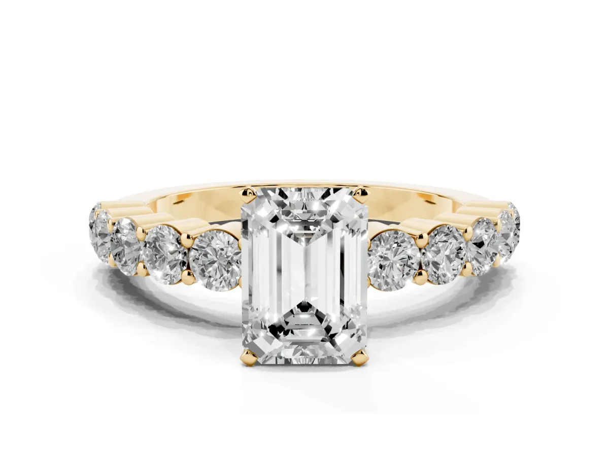 Emerald Cut Diamond Solitaire Ring with Shared Prong Round Side Stones Yellow gold