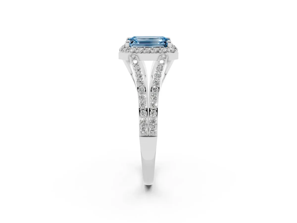 Fancy Blue Emerald Cut Halo Split Shank Pave Diamond Ring with Four-Prong Setting Silver