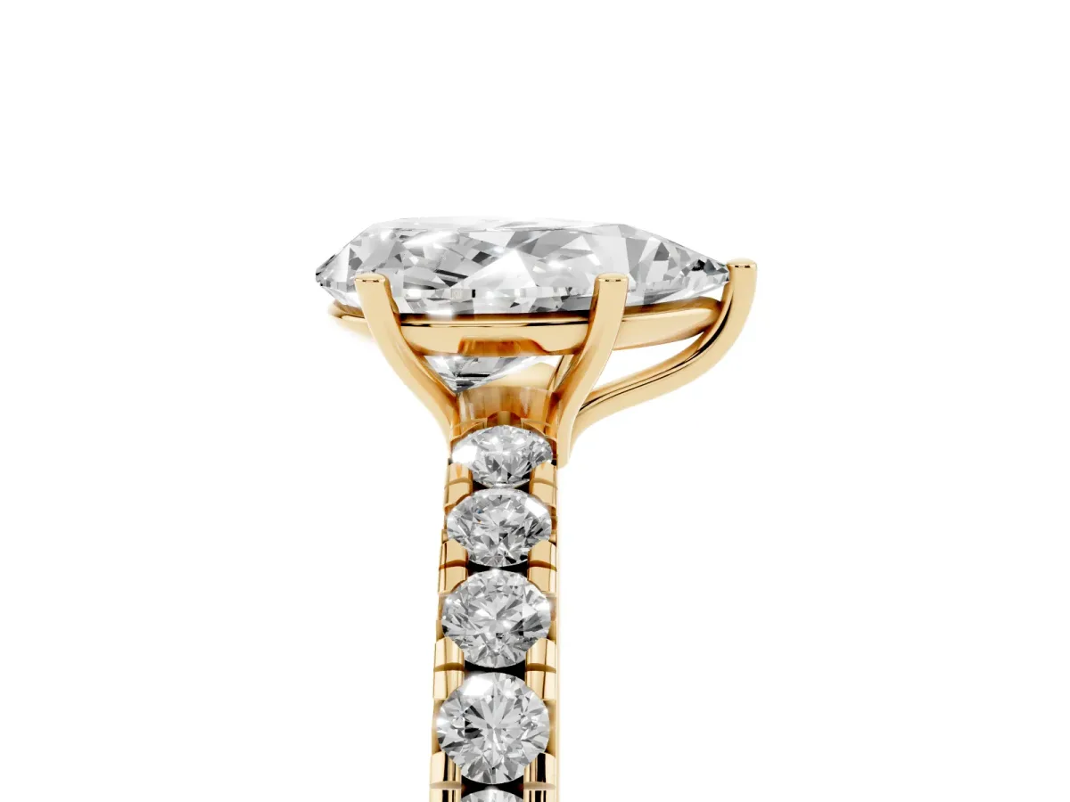 Pear Cut Diamond Pavé Solitaire Engagement Ring with Four-Prong Setting Yellow gold
