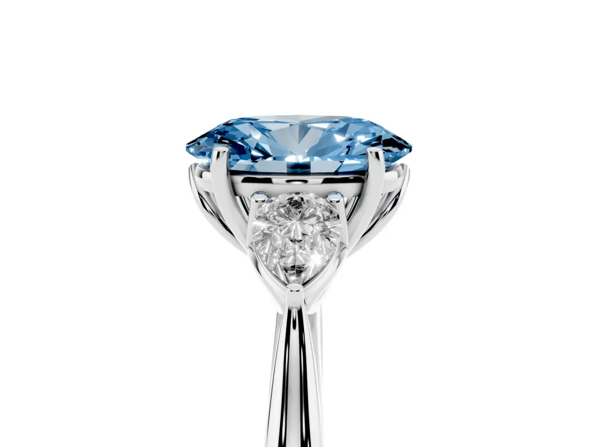 Fancy Blue Oval Cut Diamond Three-Stone Ring with Pear Side Stones and Prong Setting White gold