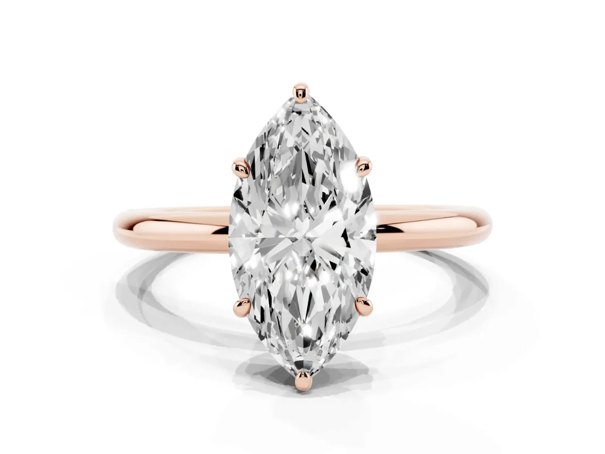 Marquise Cut Solitaire Diamond Ring with Four-Prong Setting on a Plain Band Rose gold
