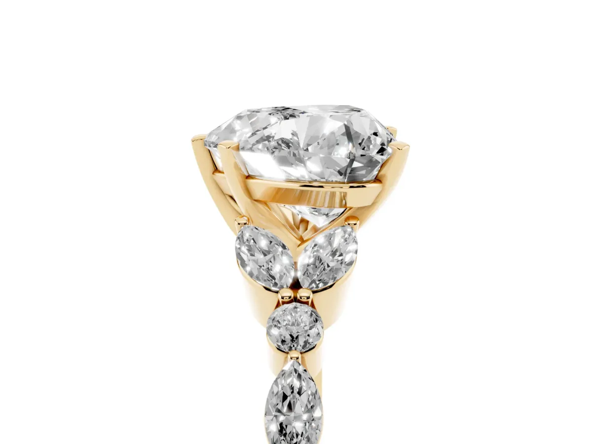 Heart Cut Diamond Solitaire Ring with Side Stones and Four-Prong Setting Yellow gold