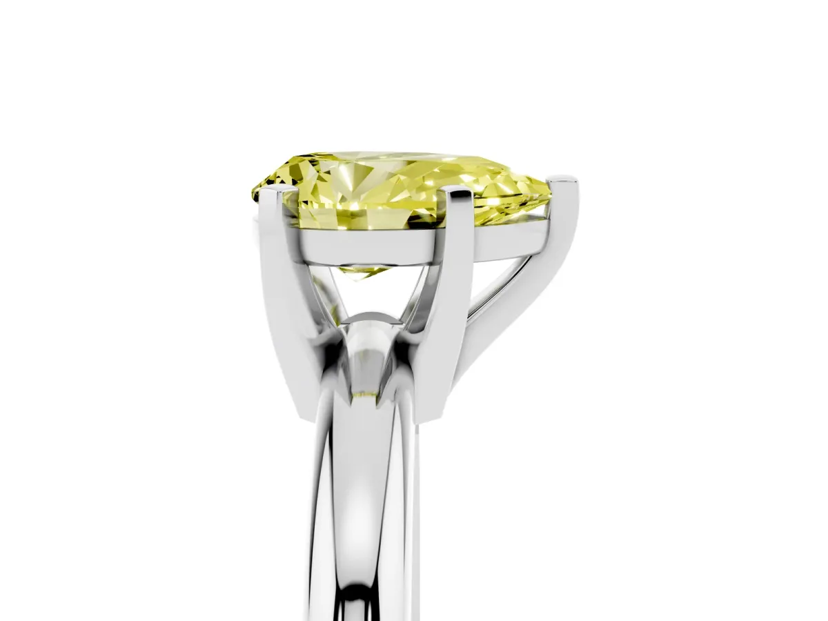 Fancy Yellow Pear Cut Diamond Solitaire Engagement Ring with Round Band and Four-Prong Setting Platinum