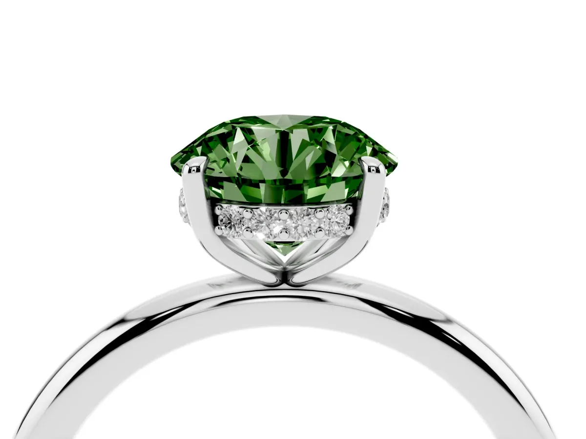 Fancy Green Round Cut Diamond Solitaire Ring with Thin Band and Four-Prong Setting Silver