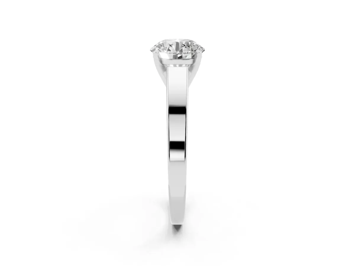 Round Cut Solitaire Engagement Ring with Four-Prong Setting and Tapered Band White gold