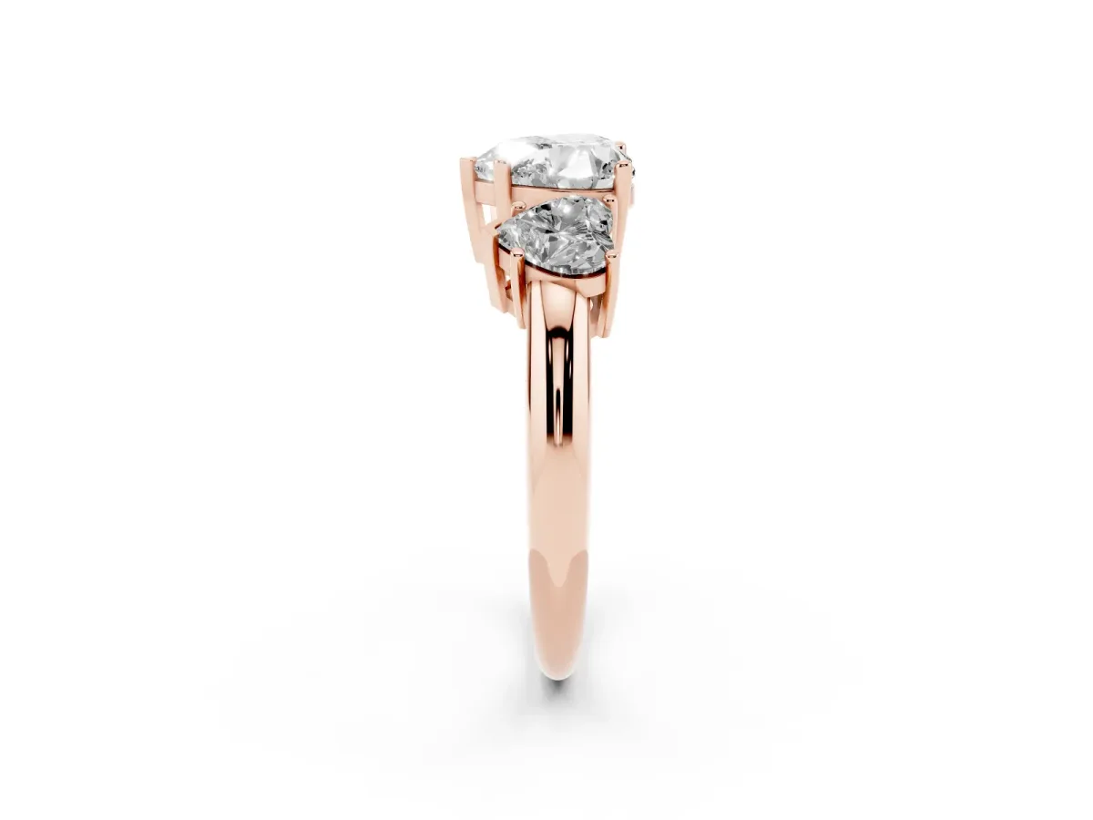 Three-Stone Heart Cut Cut Diamond Engagement Ring with Prong Setting on a White Gold Band Rose gold