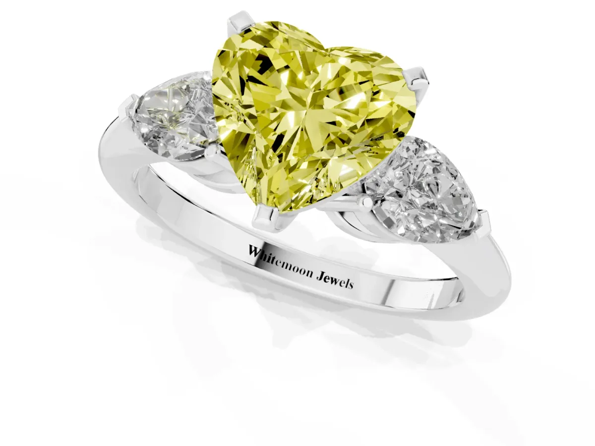 Fancy Yellow Three-Stone Heart Cut Diamond Ring with Pear Side Stones and Four-Prong Setting Silver
