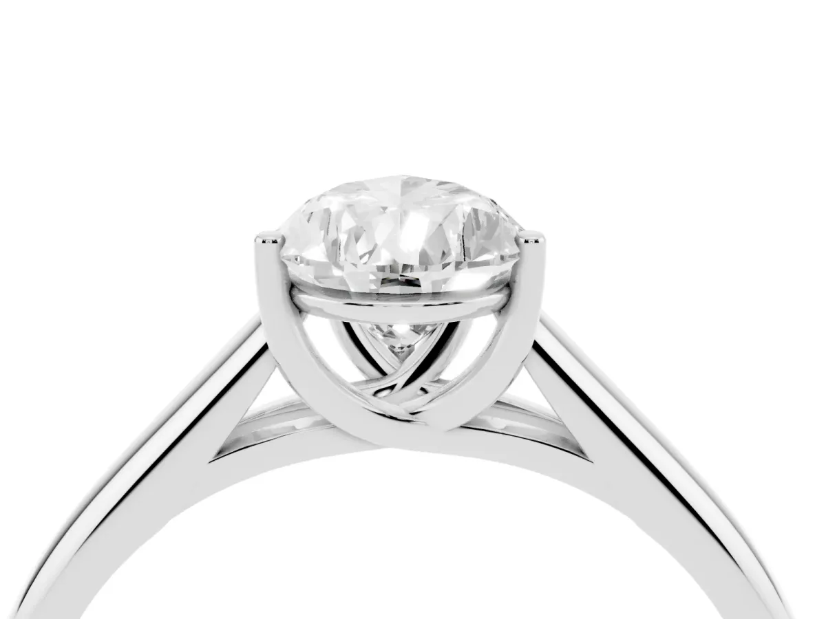 Pear Cut Solitaire Engagement Ring with Tapered Band and Four-Prong Setting White gold