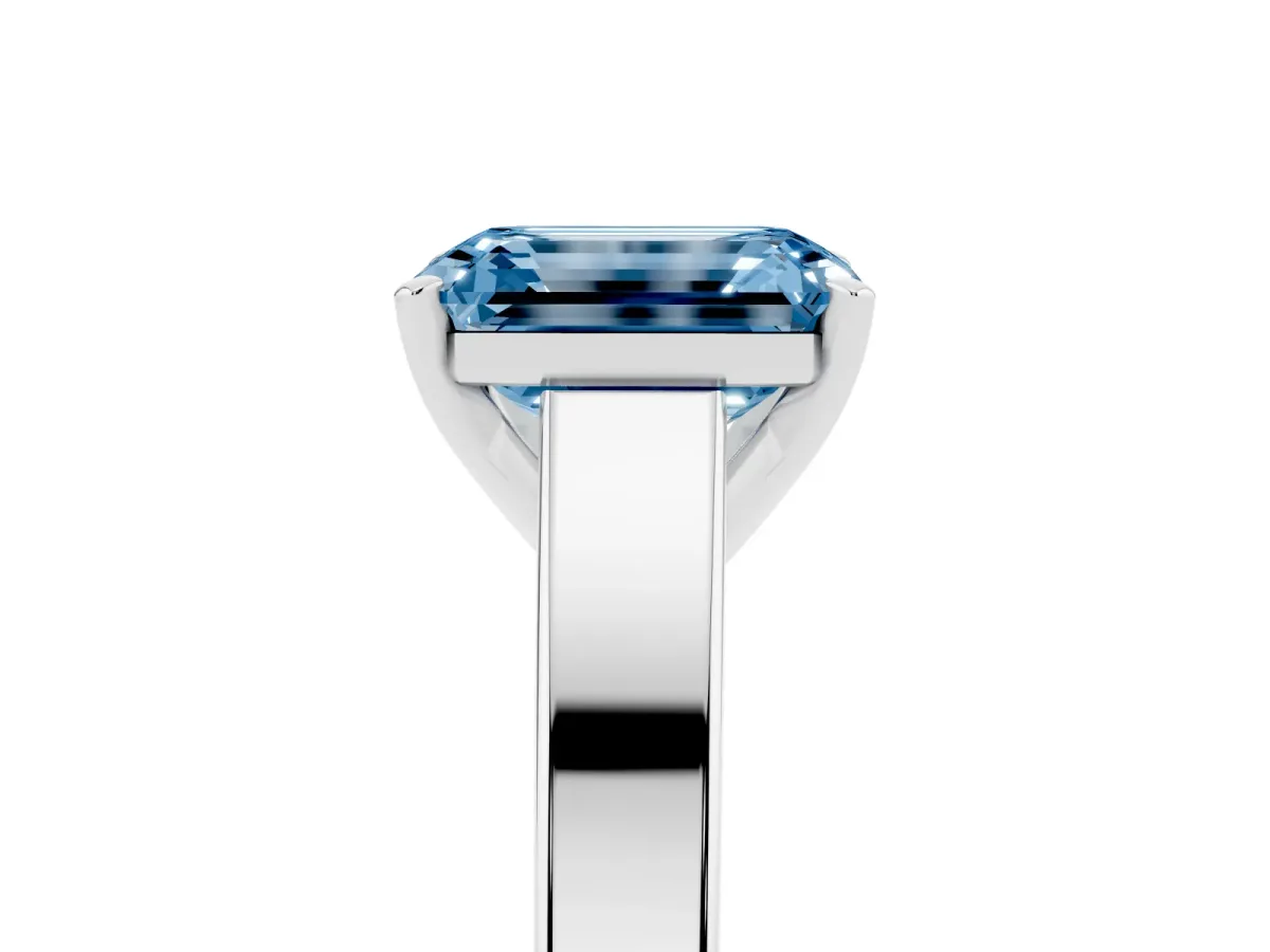 Fancy Blue Emerald Cut Solitaire Engagement Ring with Four-Prong Setting and Tapered Band Silver