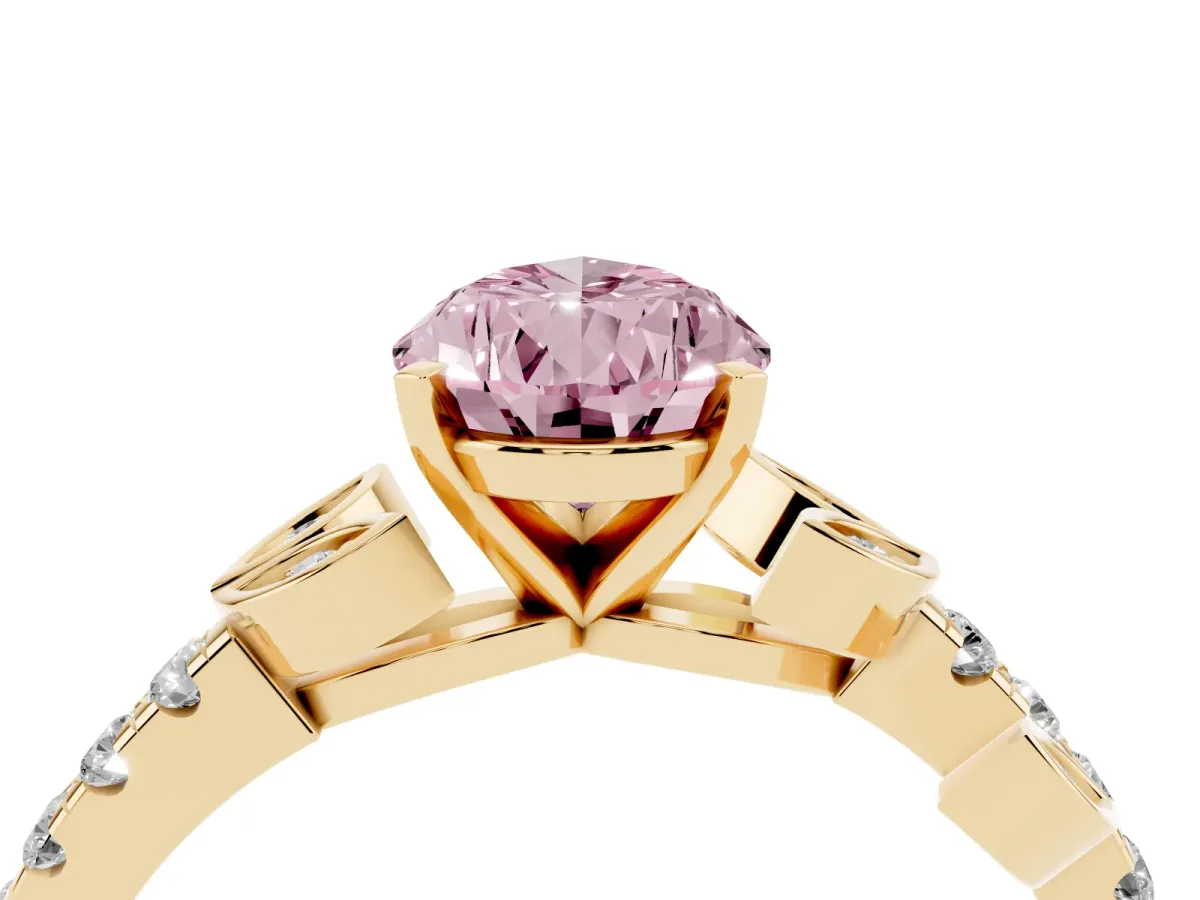 Fancy Pink Pear Cut Solitaire Leaf-Inspired Diamond Ring with Pavé Band and Four-Prong Setting Yellow gold