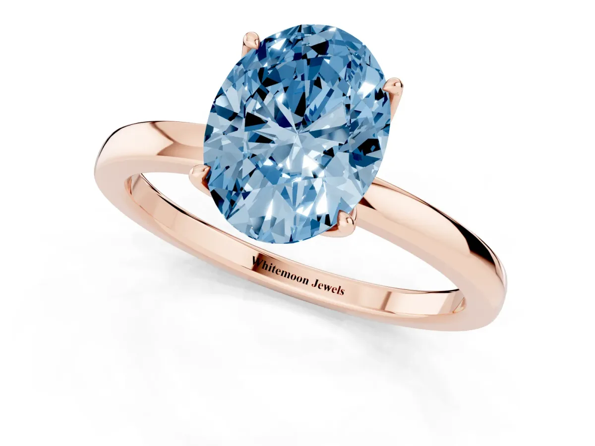 Fancy Blue Oval Cut Diamond Solitaire Ring with Thin Band and Prong Setting Rose gold