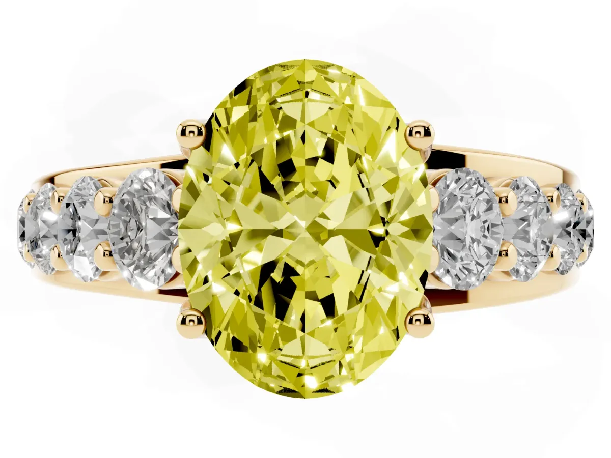 Fancy Yellow Oval Cut Diamond Engagement Ring with Pavé Band and Four-Prong Setting Yellow gold