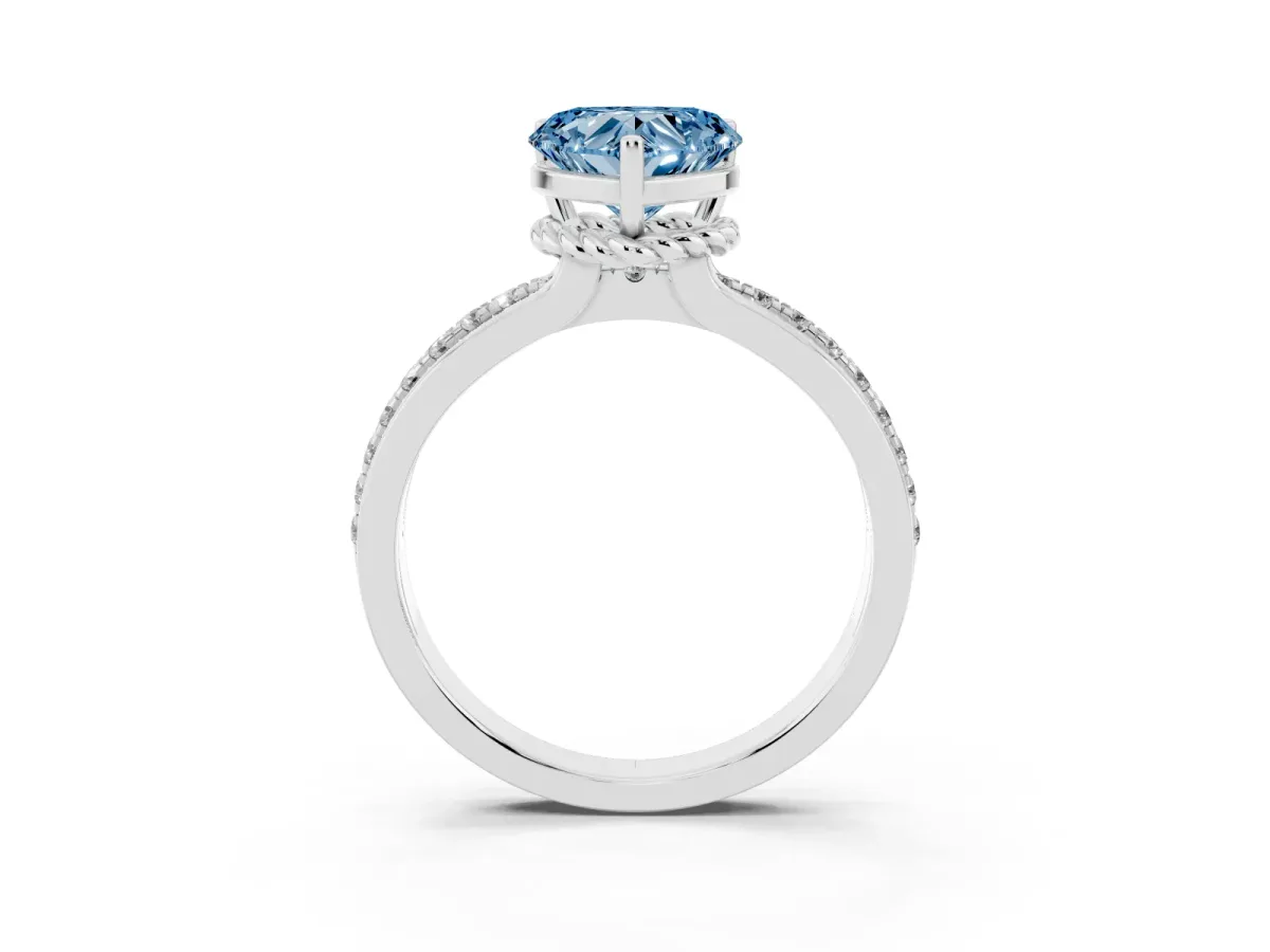 Fancy Blue Heart Cut Solitaire Diamond Ring with Channel Set Band and Six-Prong Setting Platinum