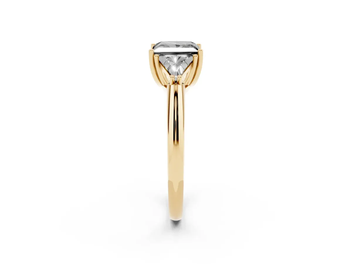 Fancy Black Three-Stone Princess Cut Diamond Engagement Ring with Trillion Side Stones and Prong Setting Yellow gold