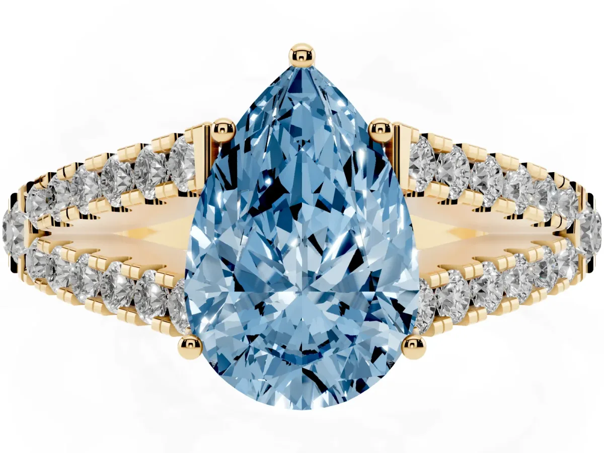 Fancy Blue Pear Cut Diamond Split Shank Pavé Engagement Ring with Four-Prong Setting Yellow gold