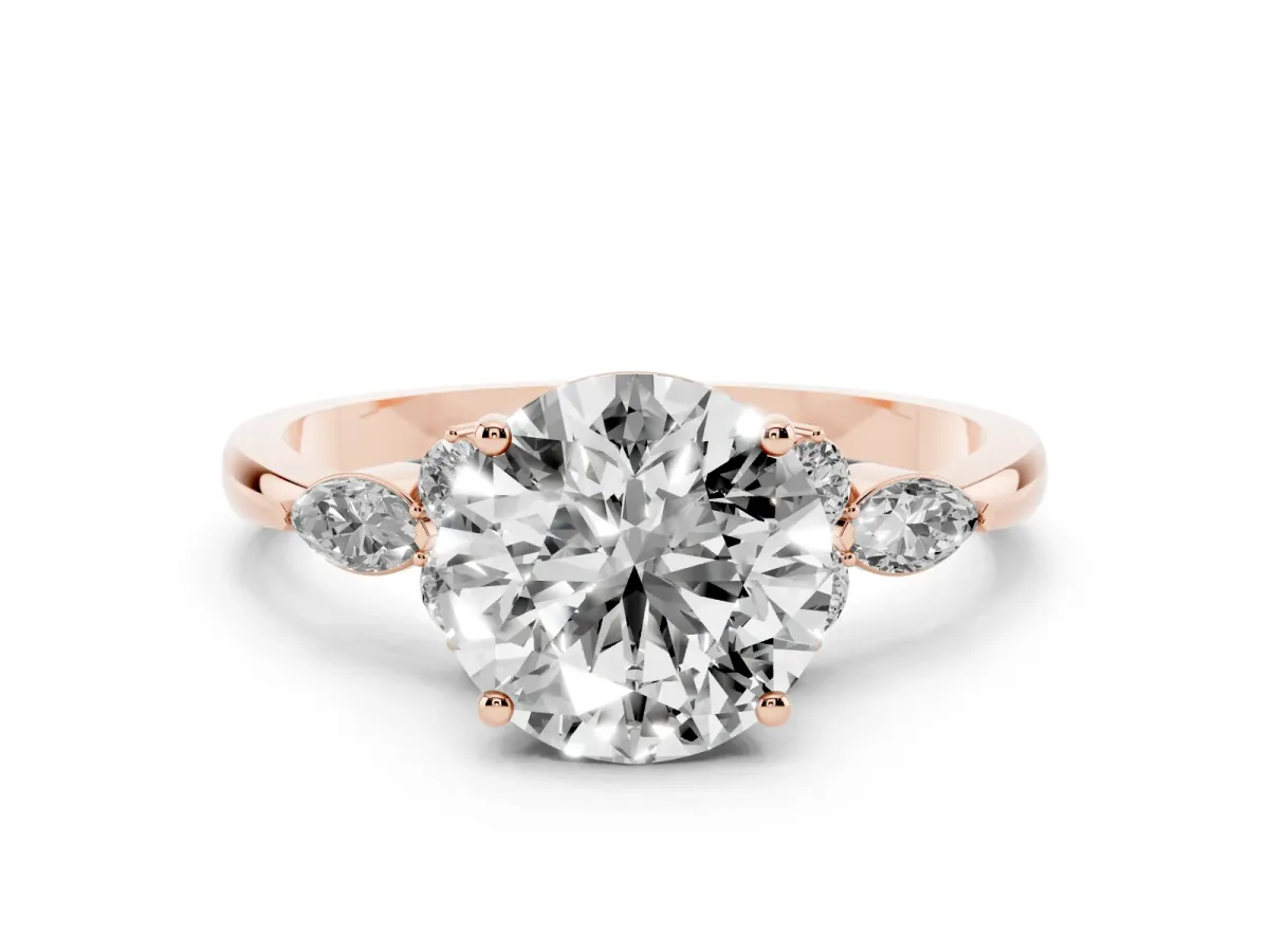 Round Cut Brilliant Diamond Solitaire Ring with Pear Side Stones and Four-Prong Setting Rose gold