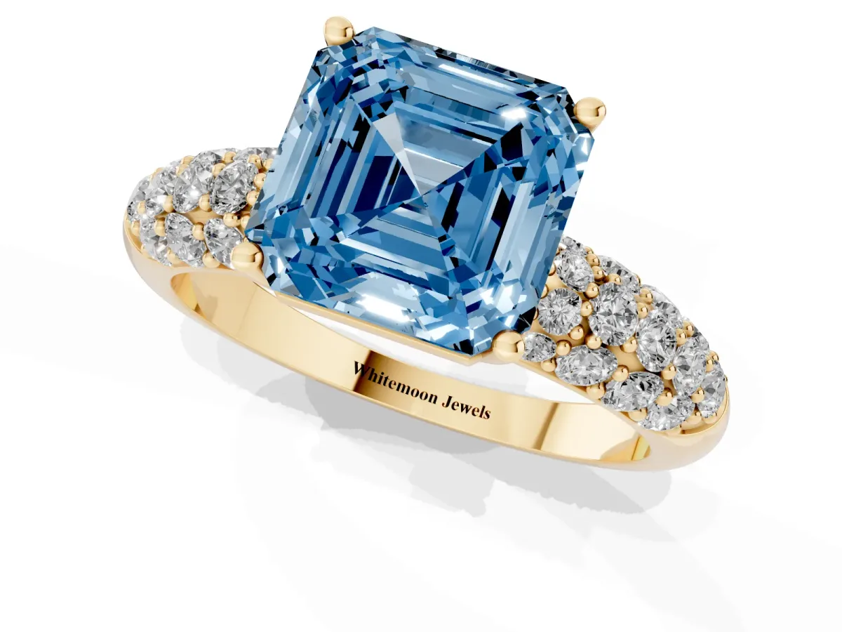 Fancy Blue Asscher Cut Diamond Pavé Band Solitaire Ring with Four-Prong Setting Yellow gold