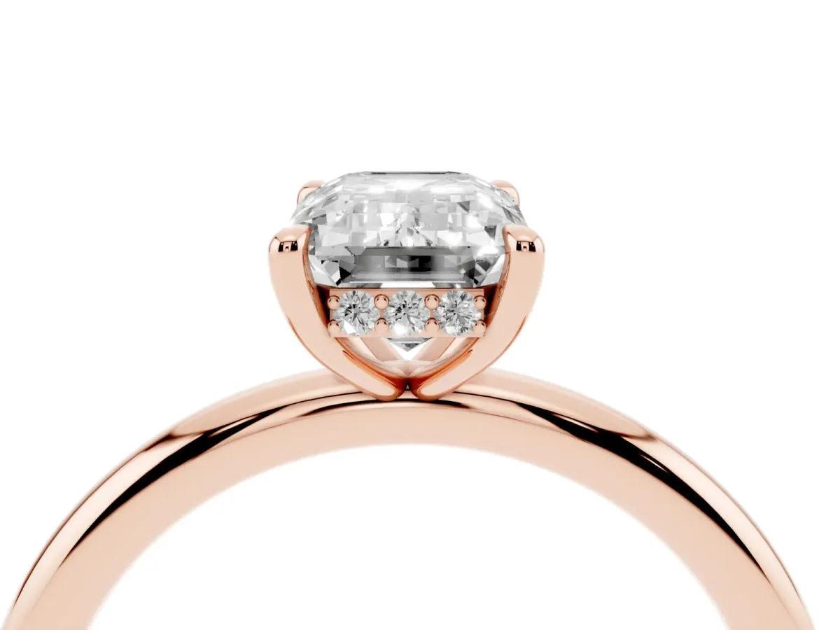 Emerald Cut Diamond Solitaire Ring with Thin Band and Four-Prong Setting Rose gold