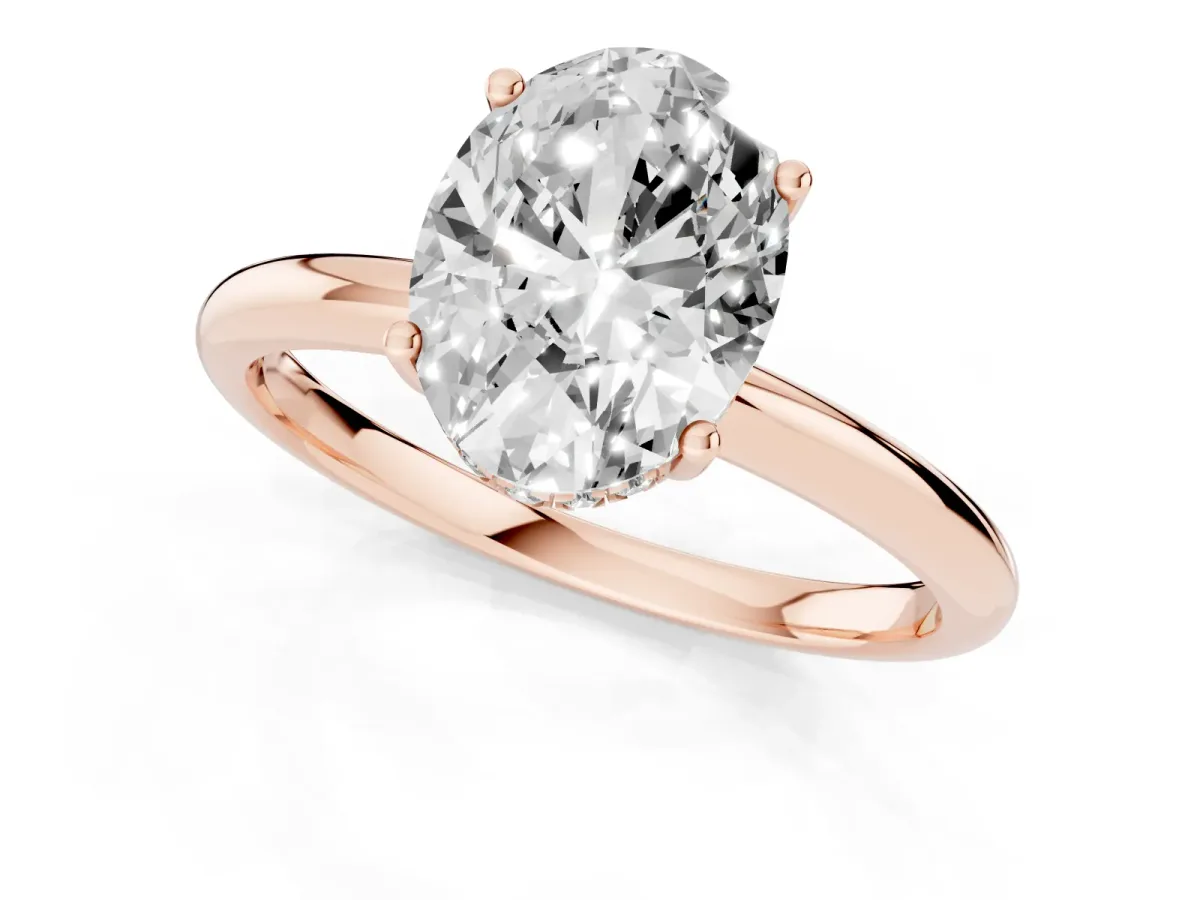 Oval Cut Cut Solitaire Engagement Ring with Four-Prong Setting and Classic Band Rose gold
