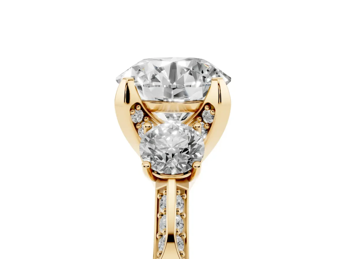 Round Cut Brilliant Three-Stone Diamond Ring with Pavé Band and Four-Prong Setting Yellow gold