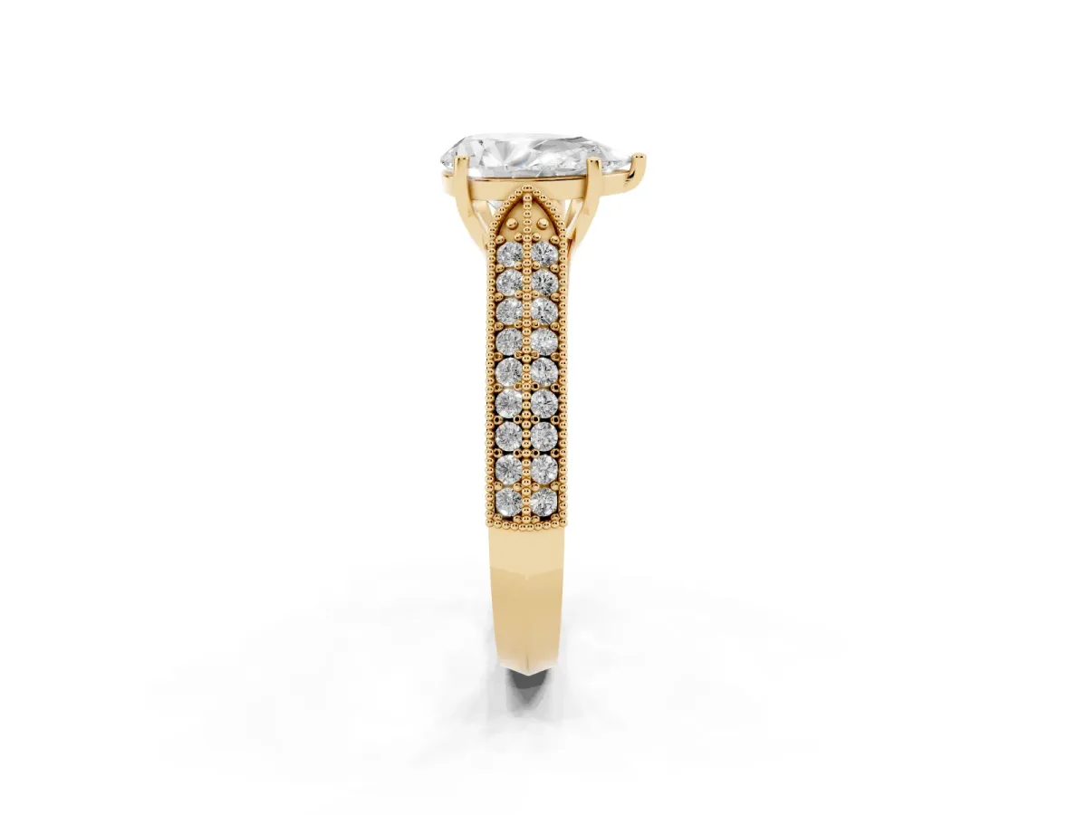 Pear Cut Cut Pave Split Shank Engagement Ring with Four-Prong Setting Yellow gold
