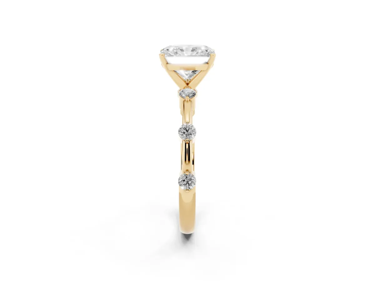 Radiant Cut Solitaire Diamond Ring with Bezel Set Side Stones and Prong Setting Yellow gold