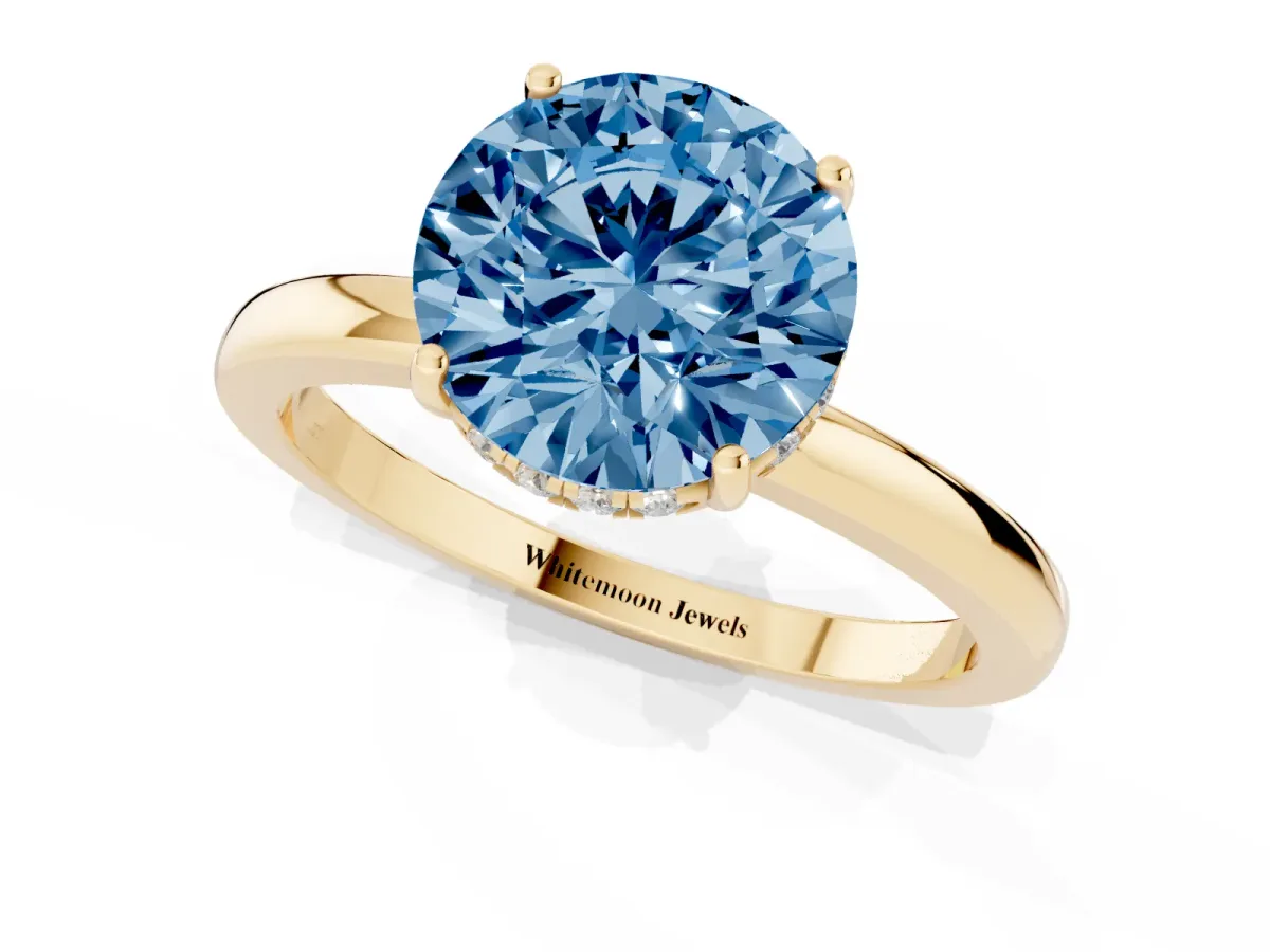 Fancy Blue Round Cut Solitaire Diamond Ring with Prong Setting and Plain Band Yellow gold