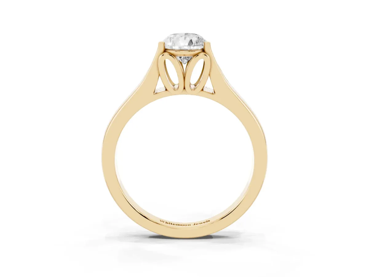 Pear Cut Solitaire Diamond Ring with Cathedral Band and Four-Prong Setting Yellow gold