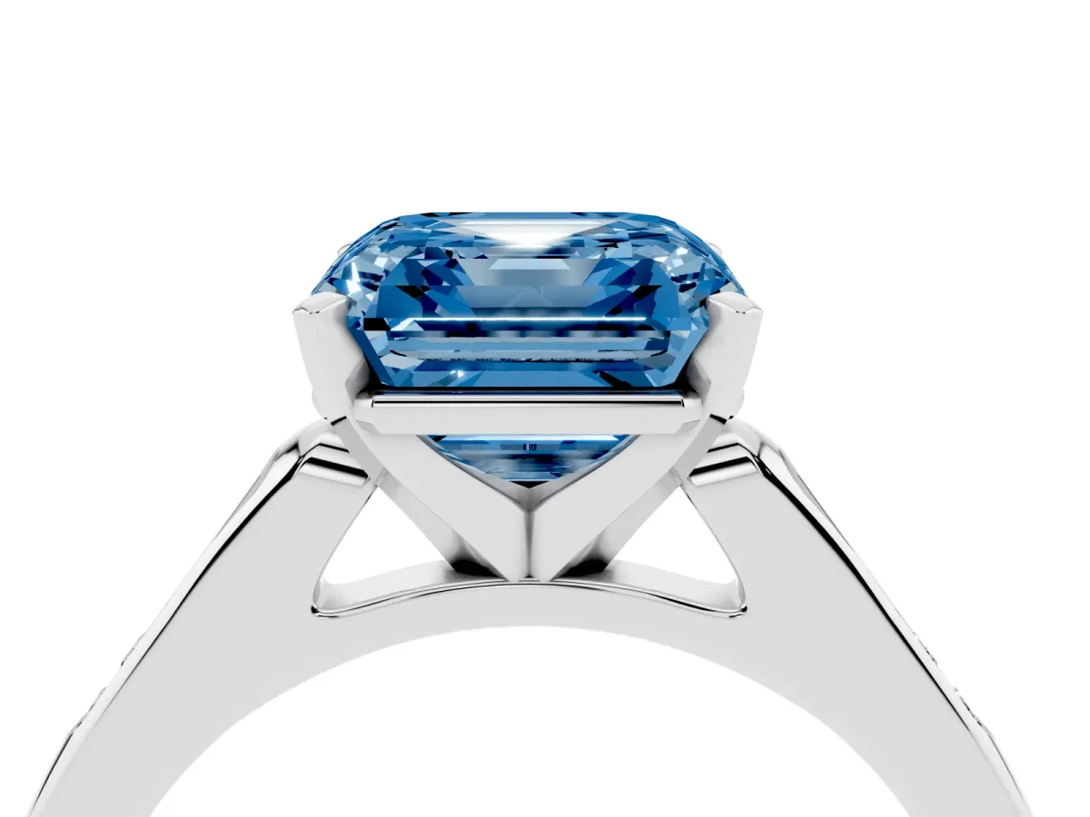 Fancy Blue Asscher Cut Diamond Solitaire Ring with Channel Set Round Band and Prong Setting Silver