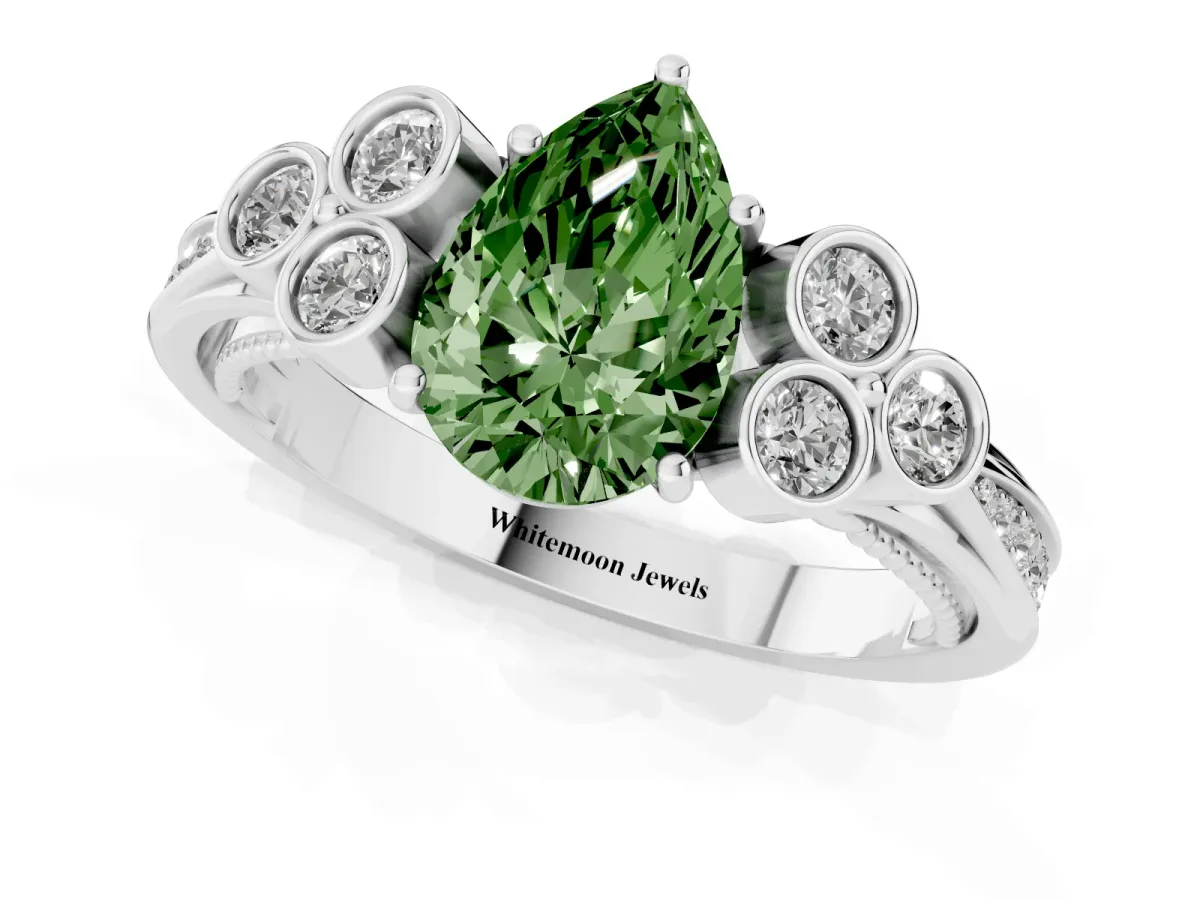 Fancy Green Pear Cut Cut Diamond Engagement Ring with Bezel Set Round Side Stones and Prong Setting Silver