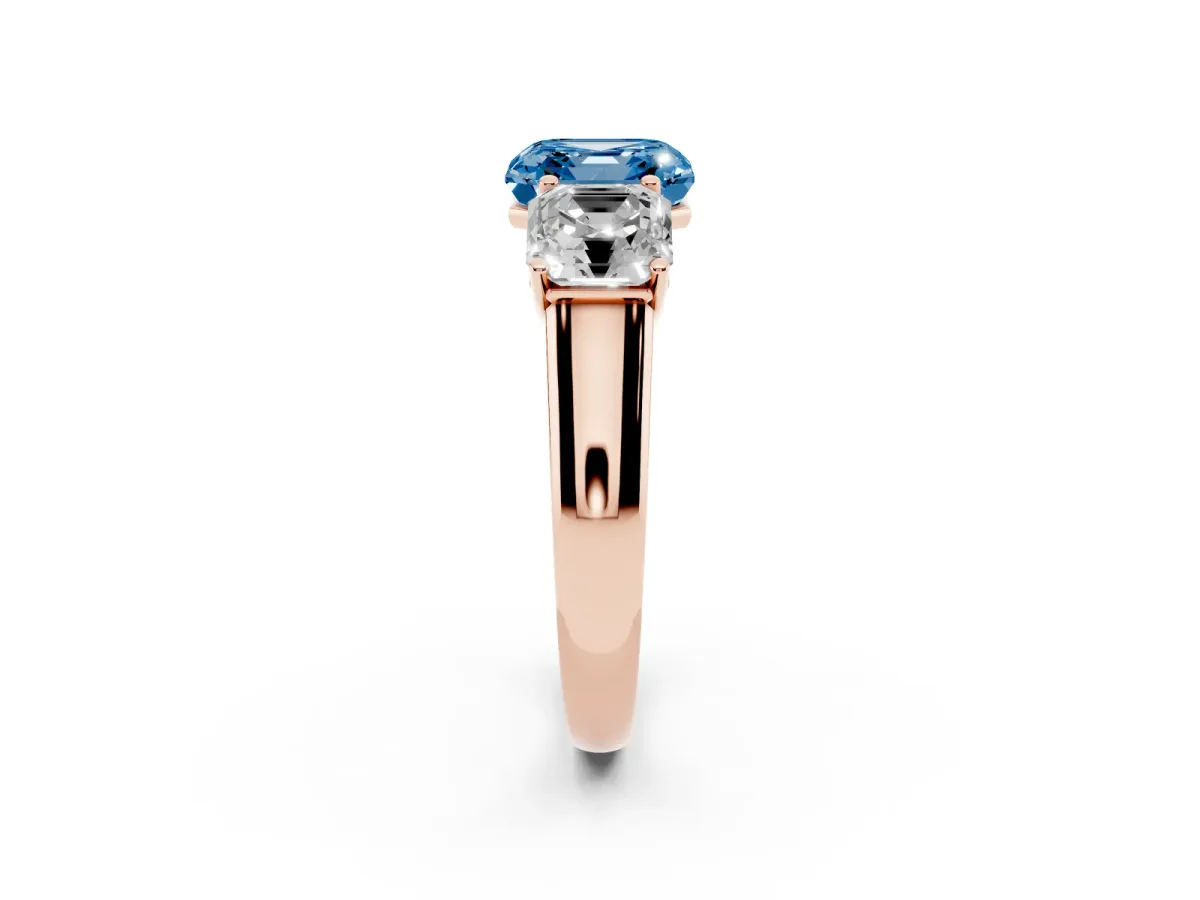 Fancy Blue Asscher Cut Three-Stone Diamond Ring with Prong Setting on a Classic Band Rose gold